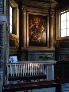Candle lit for my aunt in front of a painting of the Assumption of Mary at Chiesa Nuova. I think she'd like this painting. :)